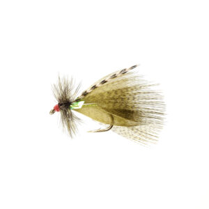 A tied fly with green feathers used for fly fishing.