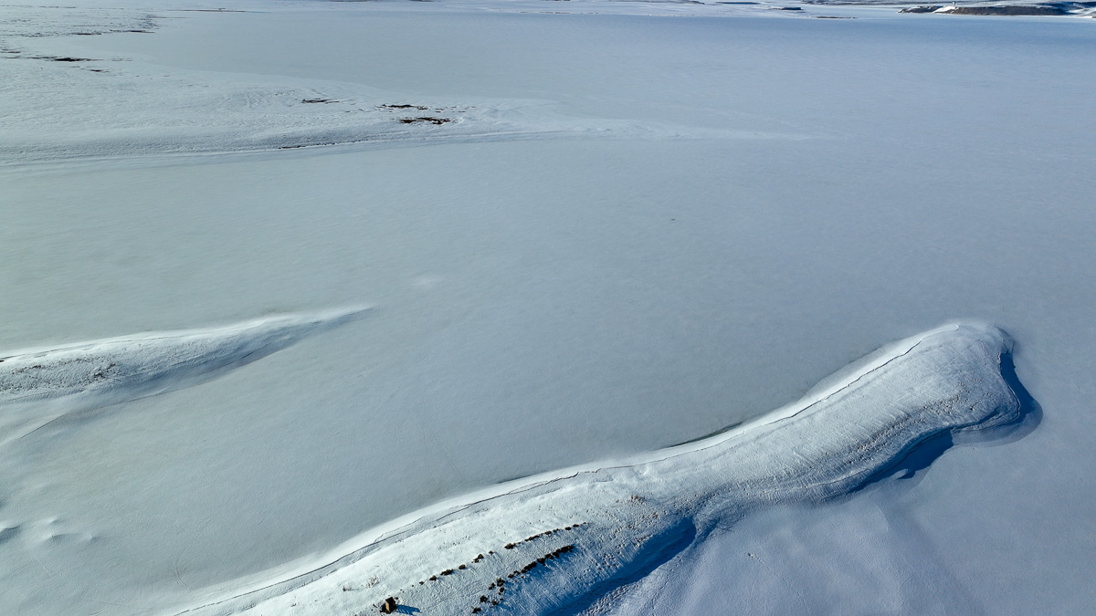 A frozen lake in the eastern sierra in April 2023 at Hilton Bay in Crowley Lake.