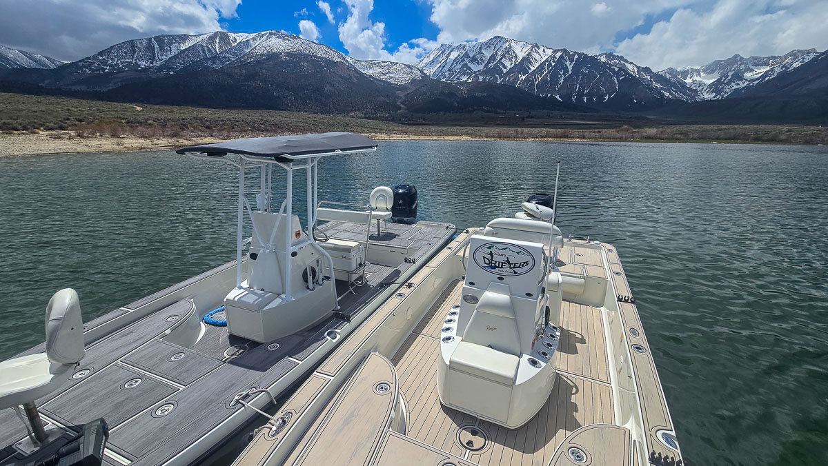 A pair of center console bay boats on on Crowley Lake near Mammoth Lakes, CA.